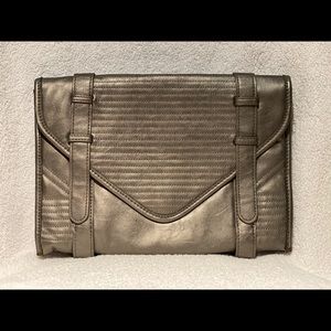 Brand new BCBG metallic silver clutch